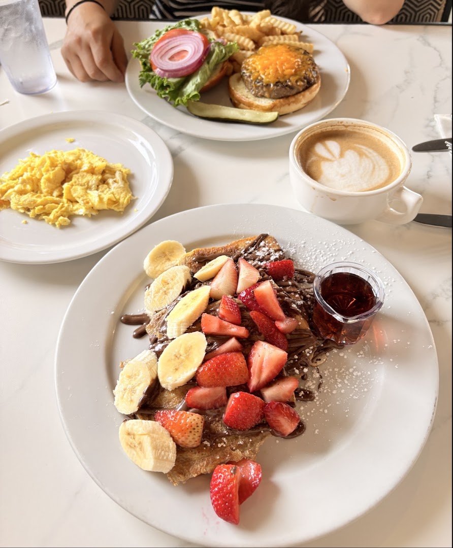 Colorful plates served in a cozy restaurant interior.