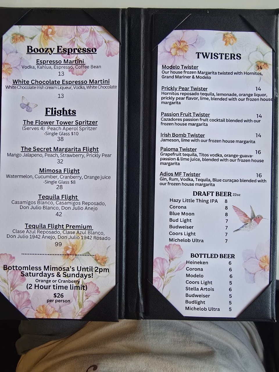 Menu board with salads, appetizers, and tacos.